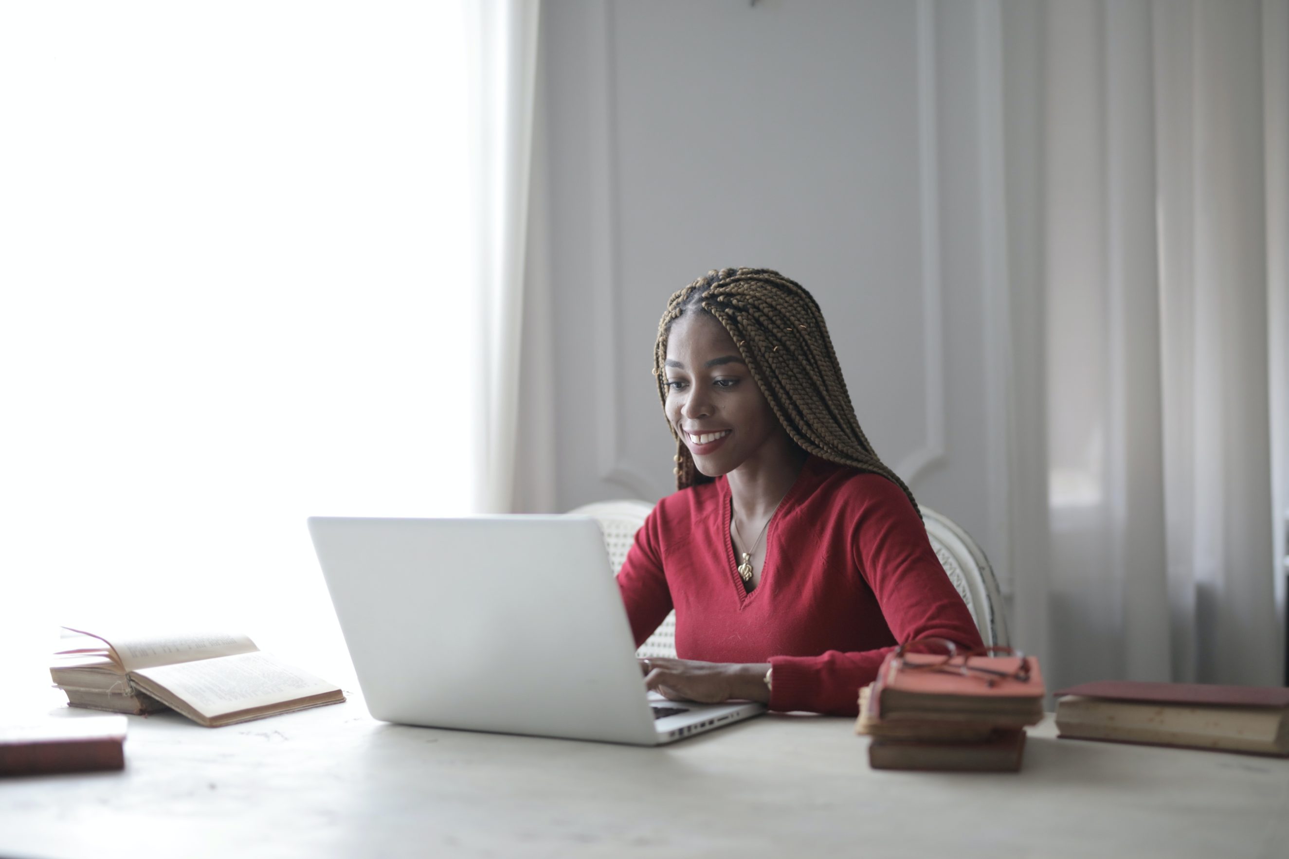 woman sitting at laptop